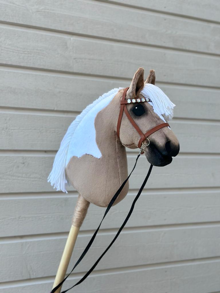 lichtbruine hobbelpaard pony a4 spring